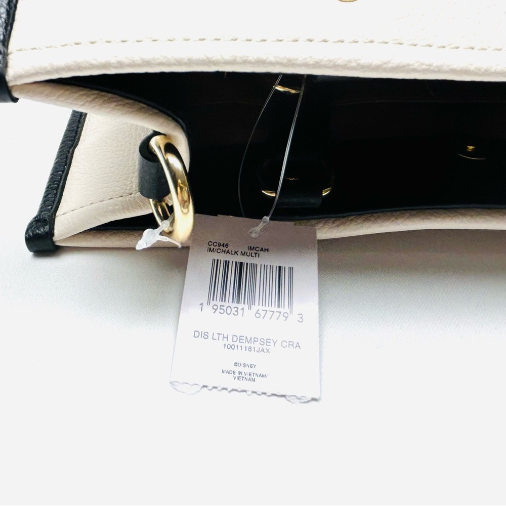 Disney X Coach Dempsey Carryall With Cruella Motif
Brand new with tags - Picture 5 of 15